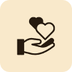 Hand holding two hearts symbolizing care and love.